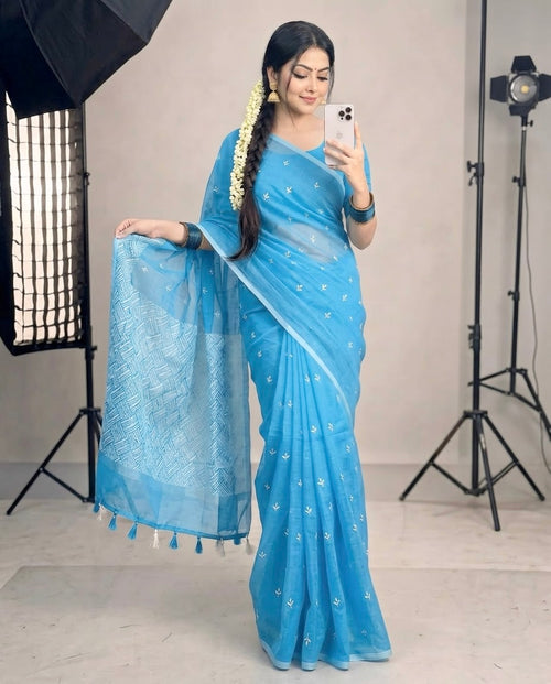 আকাশি কালার চুনা প্রিন্ট শাড়ি—হাফ সিল্ক (ব্লাউজ পিস থাকবে না)