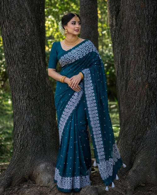 সি গ্রিন কালার-চুনা প্রিন্ট হাফ সিল্ক শাড়ি  (ব্লাউজ পিস থাকবে না)